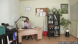 Busty office mature takes his meat from behind