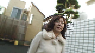 Real Japanese granny Eriko Nishimura going wild with younger guy